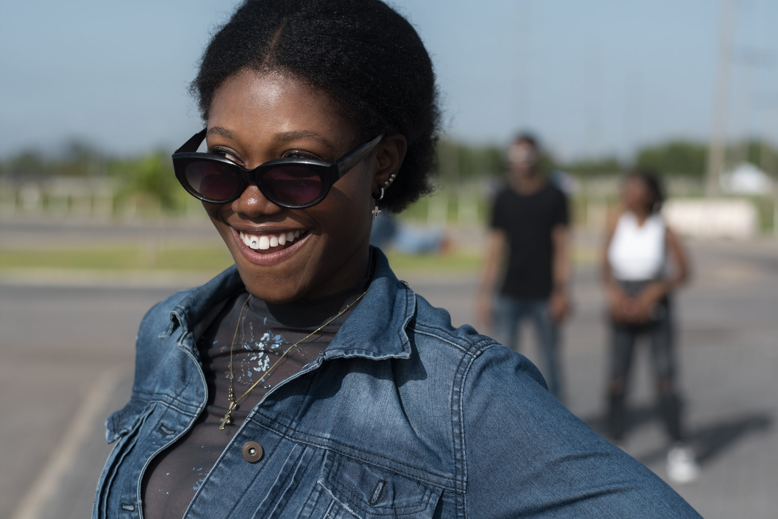 side view young woman wearing sunglasses scaled